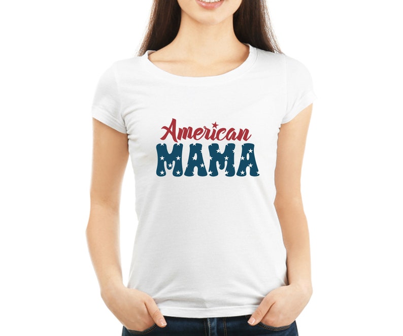 May include: White t-shirt with the text "American MAMA" in red and blue. The word "American" is in a script font, and "MAMA" is in a bold font with white stars.