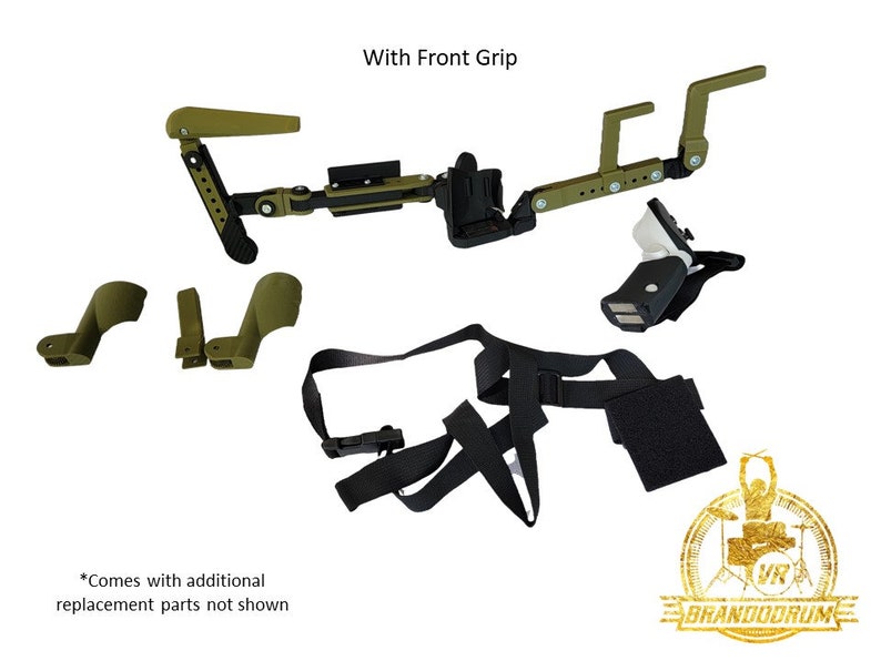 May include: A green and black drum set accessory with a front grip, two arm straps, and a shoulder strap. The accessory is designed to be worn on the body and allows for hands-free drumming. The text "With Front Grip" is visible in the image. The text "*Comes with additional replacement parts not shown" is also visible in the image.