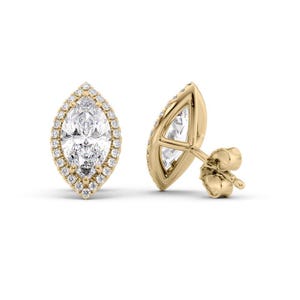 May include: A pair of gold marquise-shaped stud earrings. Each earring features a central, clear, marquise-cut stone surrounded by a halo of smaller, round, clear stones. The earrings have a post and butterfly backing.