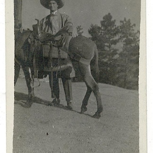 Southwestern Vaquero with Oilcloth Coat & Horse Tack – Real Photo Postcard c.1907–1917
