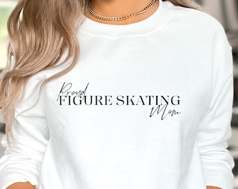 May include: White long-sleeve sweatshirt with the text "Proud Figure Skating Mom" in black.