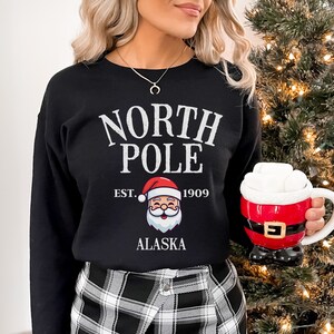 Cute North Pole Alaska Santa Clause Christmas Sweatshirt, North Pole Sweatshirt, Christmas gift for Women, Christmas Unisex 3X 4X Sweatshirt