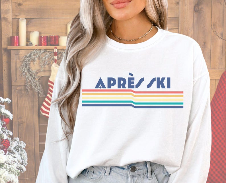 Apres ski retro 80's rainbow, vintage design with Apres Ski written over rainbow swish Apres ski sweatshirt is great gift or christmas present for a skiier or white christmas apres ski lover. cozy comfy trendy preppy top