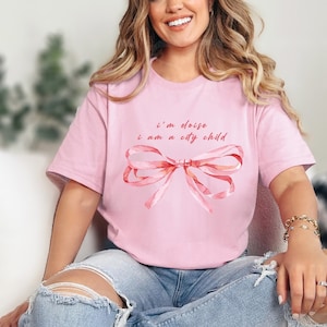 Eloise at the Plaza Tee, City Child Shirt, Eloise Tshirt, Tees for Her, Gift for Her, Nostalgic Tshirt, Pink Plaza Tee, Coquette Bow