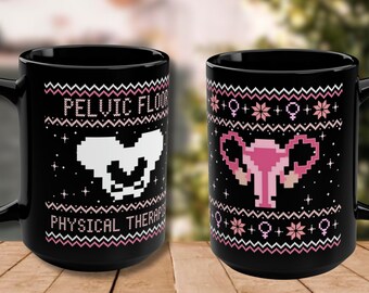 May include: Two black mugs with a white and pink pixelated design. One mug features a pelvic floor and the text "Pelvic Floor Physical Therapy". The other mug features a uterus and a repeating pattern of pink female symbols.