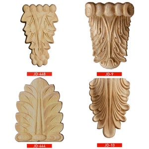 Puede incluir: Cuatro tallas decorativas de madera con intrincados diseños de hojas. Las tallas están etiquetadas como JD-448, JD-9, JD-444 y JD-10.