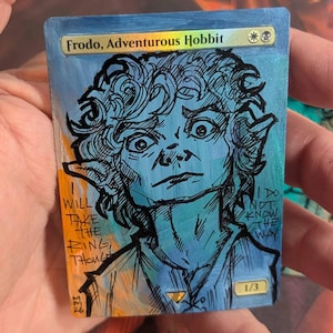 frodo mtg card MTG's LotR Mount Doom Land Explained earth (LTR) #205 Illustrated by Ekaterina Burmak Magic #greenscreen Frodo, Adventurous Hobbit //