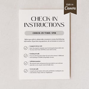 May include: A beige printed sign with the words "CHECK-IN INSTRUCTIONS" in a serif font. The sign includes check-in time, keypad entry code, parking details, Wi-Fi information, and welcome gift details. The sign has a Canva edit button.