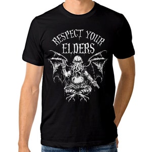 May include: Black t-shirt featuring a white graphic of a Cthulhu-like creature with wings and the text "Respect Your Elders".