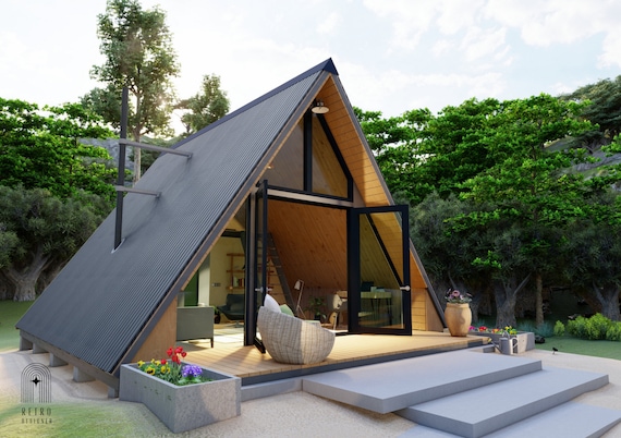 This 22'x24' modern A-Frame cabin features a spacious two-floor loft, perfect for a cozy living space or a tranquil retreat in the woods. The open-concept kitchen and living area create a welcoming atmosphere, while the unique A-Frame design adds a touch of architectural interest to the space. Available on Etsy, this house plan is perfect for those looking for a stylish and efficient living space.