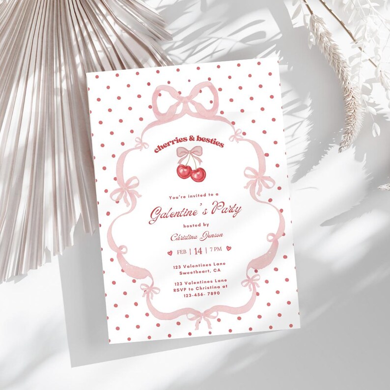 May include: A pink and white Galentine's Party invitation with a polka dot background. The invitation features the text "cherries & besties" and "Galentine's Party". The date is February 14th at 7 PM.