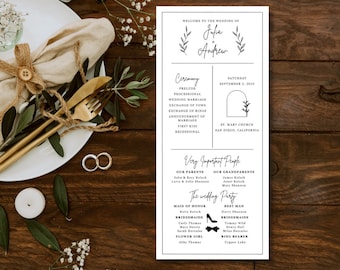 May include: A wedding ceremony program with a black and white design. The program includes the names of the bride and groom, Julia and Andrew, the date of the wedding, September 2, 2023, and the location of the ceremony, St. Mary Church in San Diego, California. The program also includes a list of the wedding party members and their roles.