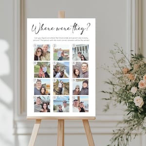 May include: A white sign on an easel with the text "Where were they?" in elegant script. The sign features 12 small photos, likely a game for a wedding or bridal shower, with the goal of guessing locations.