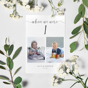 May include: A white card with the text "when we were 1" and two photos of a young girl and boy. The text "Julia & Andrew 9.2.24" is at the bottom of the card.