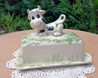 Black and white cow butter dish