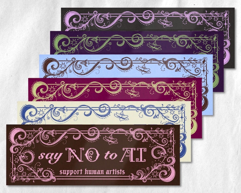 May include: A stack of rectangular cards with ornate floral and swirl designs in various colors. The bottom card is brown with pink accents and the text "say NO to AI support human artists". Other cards are purple, blue, and green.