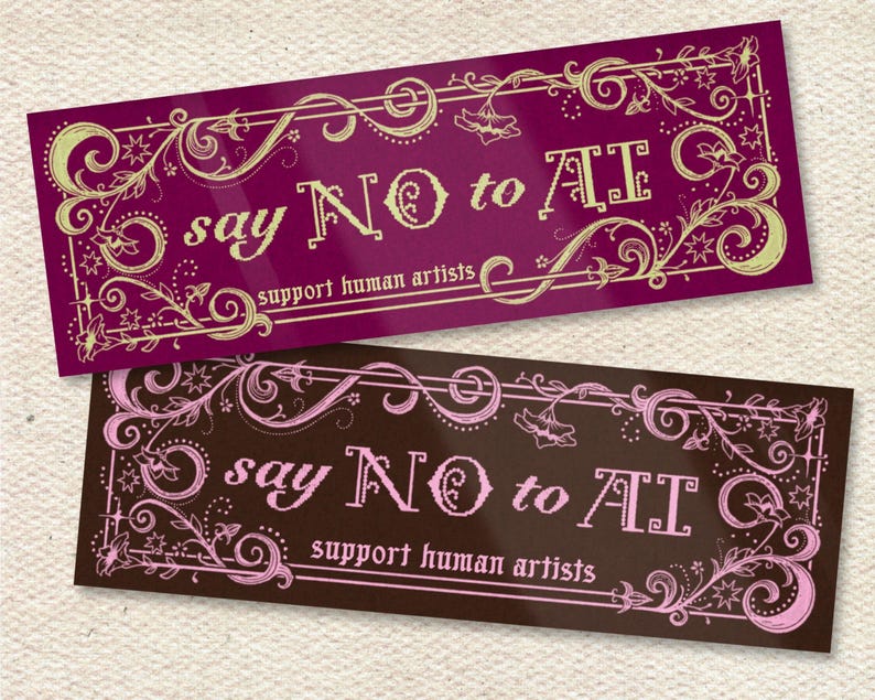 May include: Two rectangular stickers with ornate floral borders. The top sticker is a deep magenta with gold accents and the text "say NO to AI, support human artists." The bottom sticker is brown with pink accents and the same text.