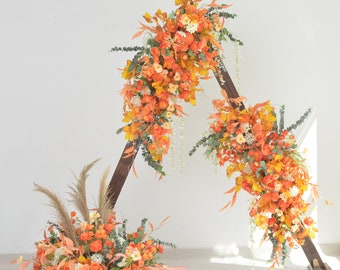 Wedding Arch Flowers Arrangement with Roses and Silver Eucalyptus in Shades of Orange