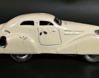 RARE ET ANCIEN JOUET SCHUCO DALLI 1011 EN METAL AVEC PERSO OLD TOY VOITURE