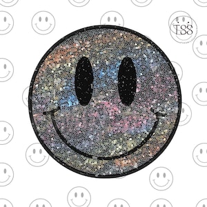 Puede incluir: Una gran cara sonriente de purpurina iridiscente con un contorno negro. La purpurina es una mezcla de azul, verde, rosa y morado.