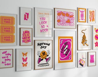 May include: A gallery wall of 12 framed prints with various designs and colors. The prints feature phrases like "Good Times", "Love is a Way of Being", "Spread Joy", and "Love You More". Some prints feature abstract designs, while others feature illustrations of a tiger, butterflies, and a smiley face.
