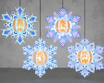 Peut inclure: Quatre ornements en forme de flocon de neige bleu et blanc sur un fond blanc. Chaque flocon de neige a un motif circulaire orange en papier découpé au centre. Les motifs représentent un cerf et un sapin de Noël.