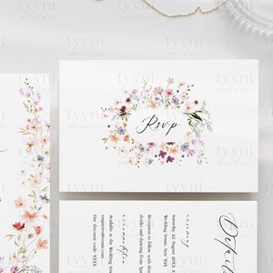 May include: Wedding invitation featuring a floral design. The invitation is for Emily and Benjamin's wedding on 22nd August 20XX at a venue in New York. The RSVP card features a floral wreath with the word "RSVP" in the centre.