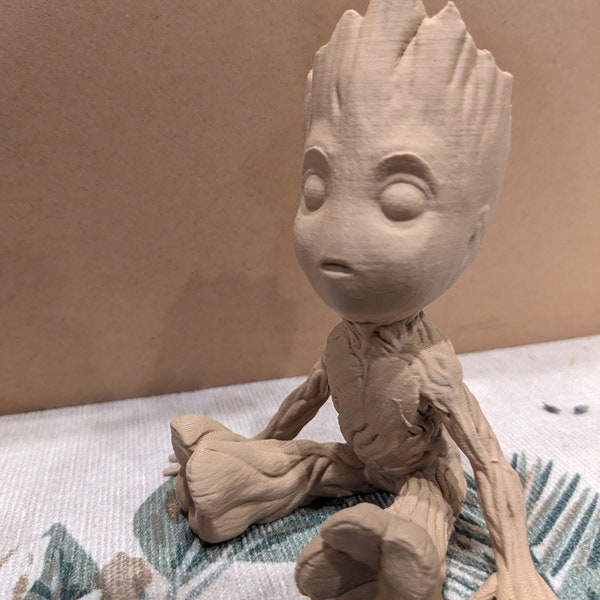 Give a touch of originality and fun to your home with the Baby Groot sitting pot The ideal gift for Guardians of the Galaxy fans