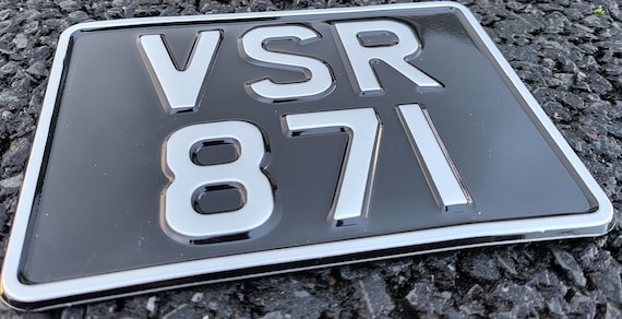 Black and 2024 silver number plates