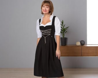 Black dirndl without apron, size 42, in stock for Oktoberfest or folk festivals in Bavaria, Germany, Tyrol - Ischgl, Austria