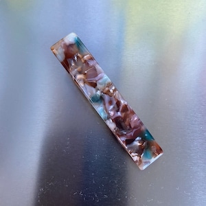 smooth polished hair clips in multiple colors, perfect gift accessories.