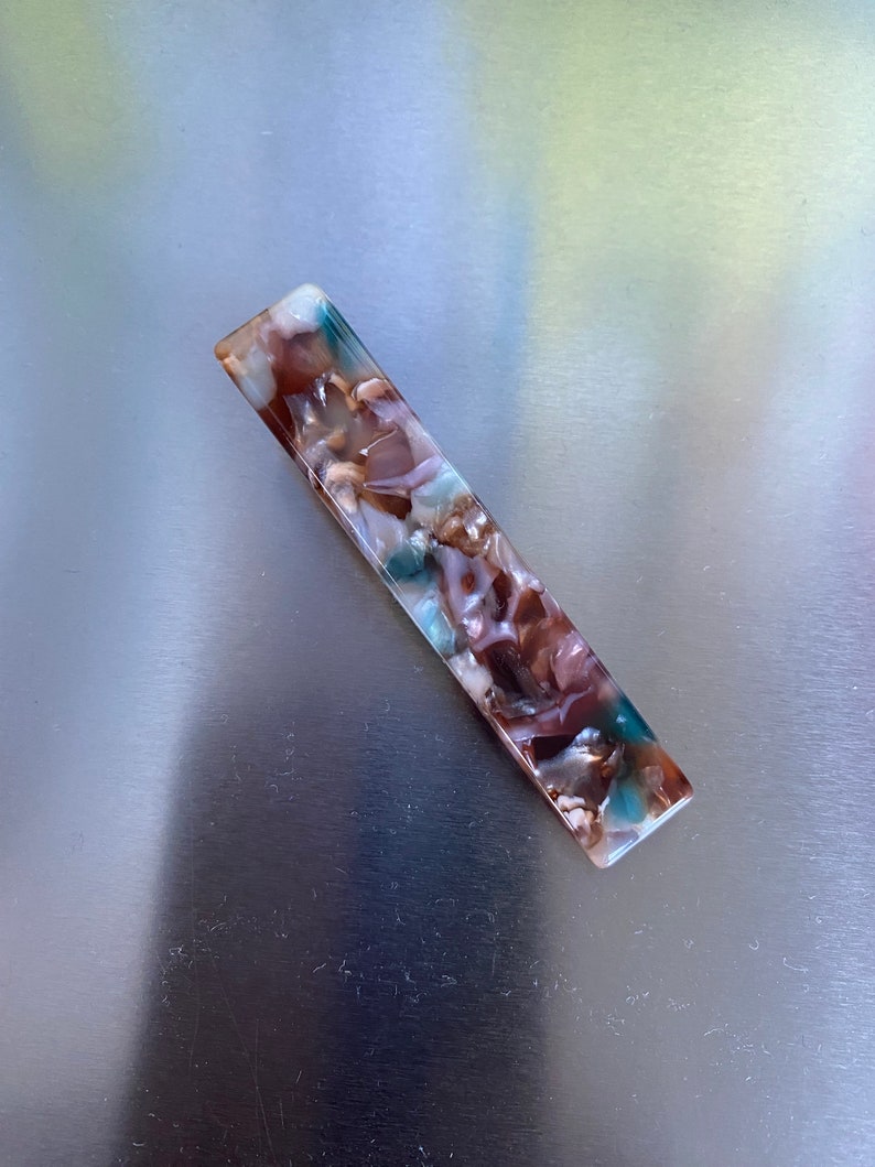 smooth polished hair clips in multiple colors, perfect gift accessories.
