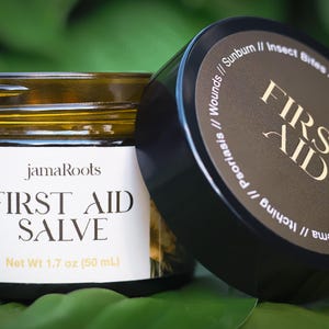 Herbal first aid salve made with calendula, plantain & yarrow—crafted for skin-soothing support on cuts, bites, bumps, and daily ouchies.