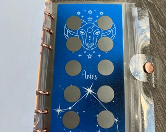 Zodiac Scratch Off Savings Challenge Binder, 2000 Dollars Savings