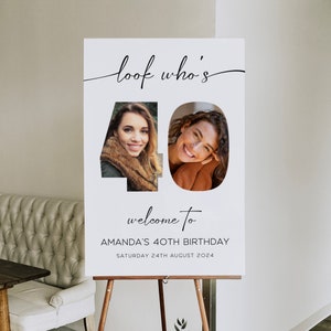 May include: A white birthday welcome sign on a wooden easel. The sign reads "look who's 40" with two photos inside the numbers. Below the photos, it says "welcome to AMANDA'S 40TH BIRTHDAY SATURDAY 24TH AUGUST 2024".