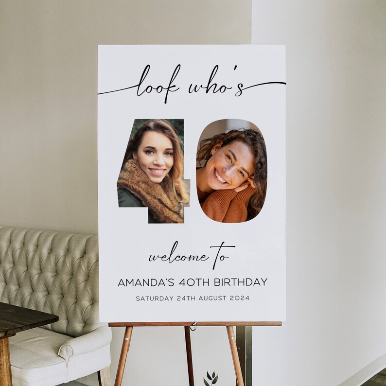 May include: A white birthday welcome sign on a wooden easel. The sign reads "look who's 40" with two photos inside the numbers. Below the photos, it says "welcome to AMANDA'S 40TH BIRTHDAY SATURDAY 24TH AUGUST 2024".