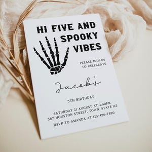 May include: Black and white invitation with a skeleton hand graphic. The text reads "Hi Five and Spooky Vibes" and "Jacob's 5th Birthday". The invitation includes details for the party, including the date, time, address, and RSVP information.