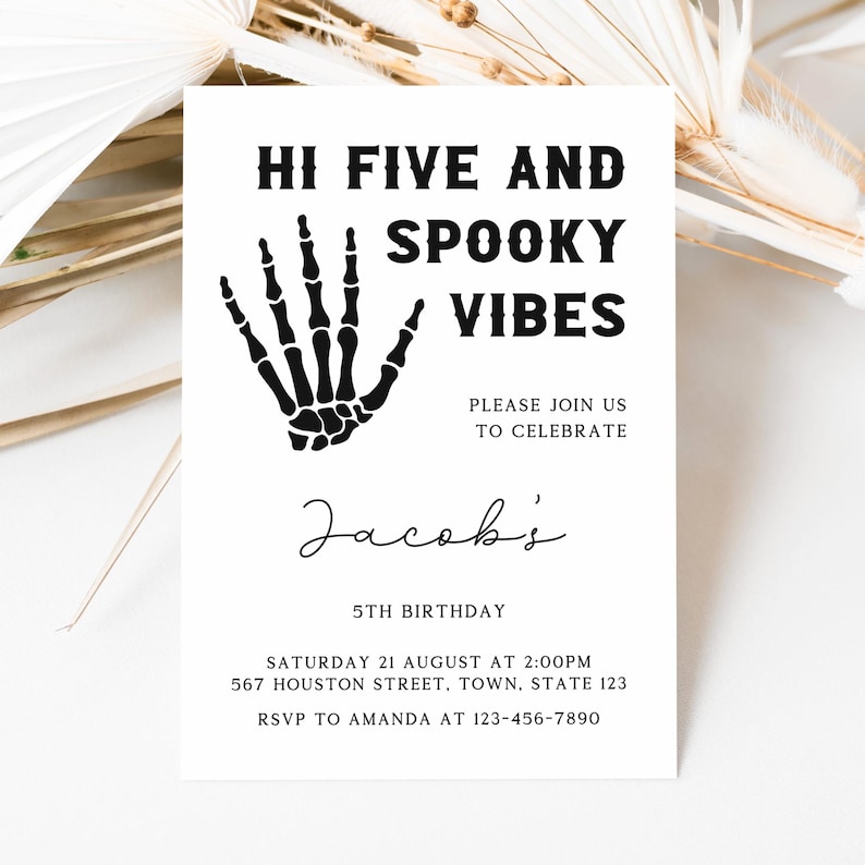 May include: Black and white invitation with a skeleton hand giving a high five. The text reads "Hi Five and Spooky Vibes" and "Please join us to celebrate Jacob's 5th Birthday". The invitation includes the date, time, and address for the party.