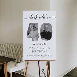 May include: A white sign with black text that reads "look who's 40". The number 40 is made up of two photos, one of a young boy and one of an older man. The text below the photos reads "Welcome to DAVID'S 40th BIRTHDAY Saturday 24th August 2024".