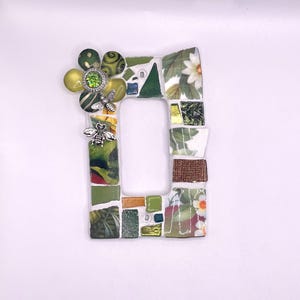 グリーンフラワーとグリーンワールドのモザイクロッカーライトスイッチカバー