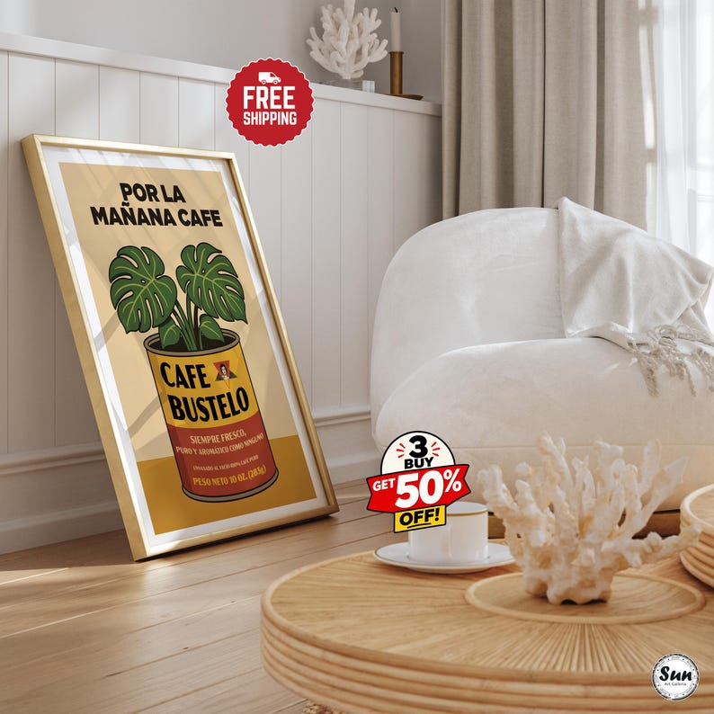 May include: A framed vertical wall art print featuring a yellow and red Cafe Bustelo coffee can with a green monstera plant growing out of the top. The text reads POR LA MA&Ntilde;ANA CAFE, CAFE BUSTELO, SIEMPRE FRESCO, PURO Y AROMATICO COMO NINGUNO, PESO NETO 10 OZ.