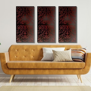May include: Three abstract art panels with a black background and red pixelated designs. The panels are hanging on a white wall above a brown leather couch.