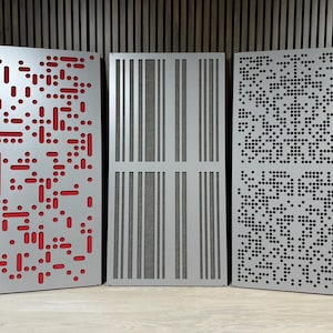 May include: Three acoustic panels with different patterns of holes. The panels are made of a light gray material and have a slightly textured surface. The first panel has a random pattern of red and white holes. The second panel has a pattern of vertical lines of holes. The third panel has a pattern of small, evenly spaced holes.