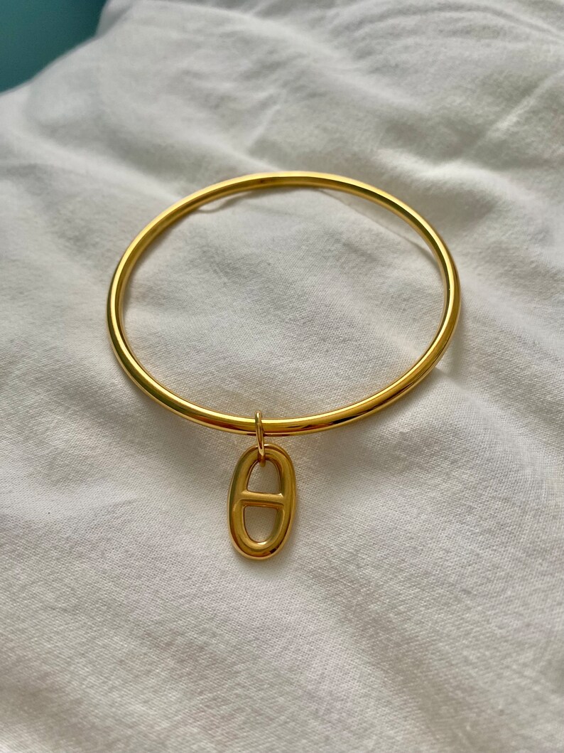 golden stainless steel bangle with charm image 6