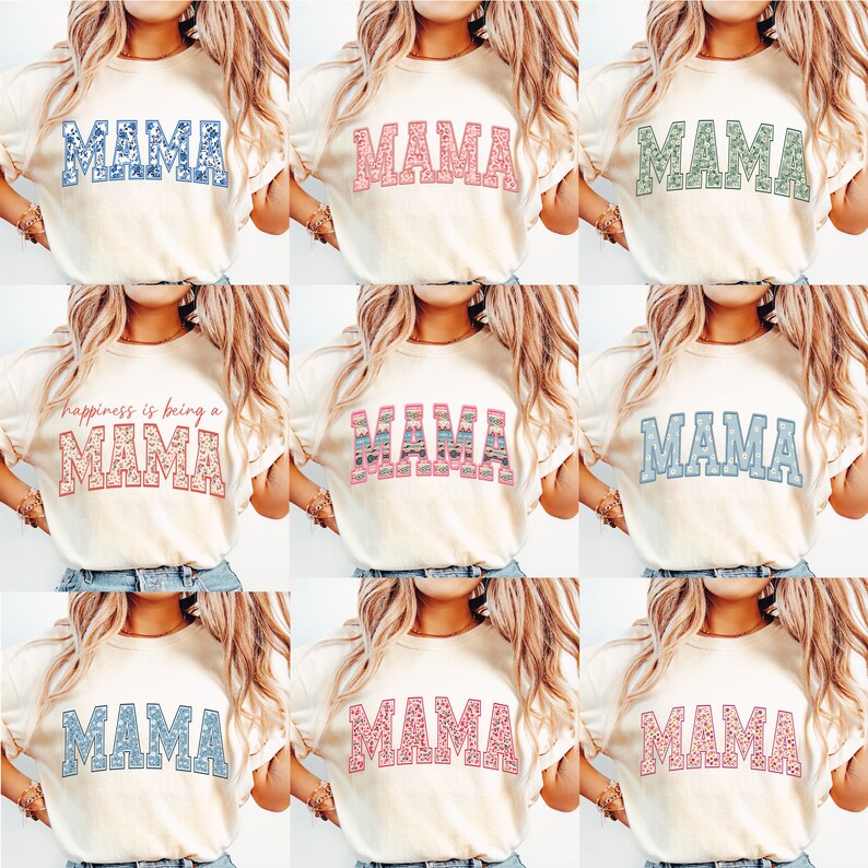May include: Nine different t-shirts with the word "MAMA" printed on them in various colors and patterns. The shirts are all white and have short sleeves.
