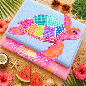 May include: Two beach towels, one light blue and one pink, are stacked. Each towel features a colorful sea turtle design with a patchwork shell and pink accents. The scene includes sunglasses, watermelon slices, and tropical flowers.