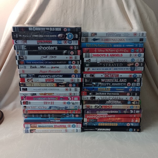 DVD. STONE COLD, Christmas Carol The Musical, No Country for Old Men, Forest Gump, Home Alone, Aliens, Muppet Christmas Carol, The Shinning