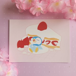 Peut inclure: Une illustration rose et blanche d'un pingouin portant une chemise bleue et jaune, dormant sur un gâteau aux fraises avec un fond rose.