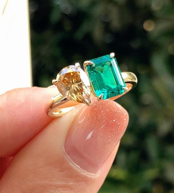 Green stone deals wedding rings