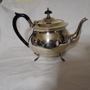 Yeoman Plate Electro Plate Silver Teapot with black handle, extremely good condition.